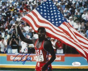 Carl Lewis Signed Autographed USA Olympics 8x10 Photo (JSA COA)